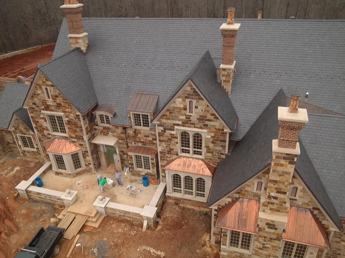 Craftsman Roofing Slate Roof Repair project in Christy Acres